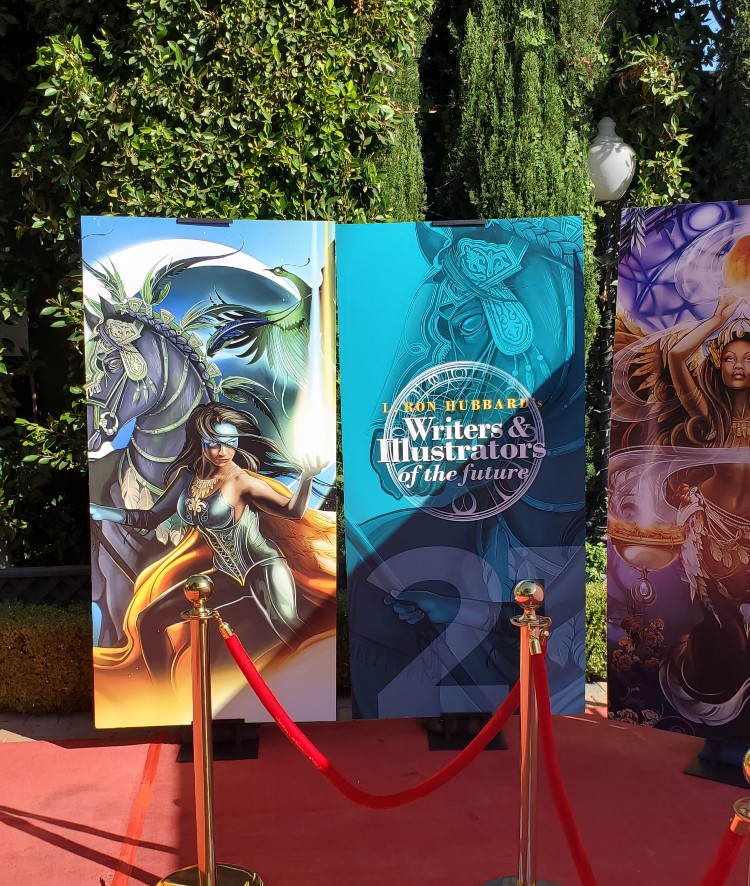 an image of the two book covers on panels, with a panel in the middle advertising the awards